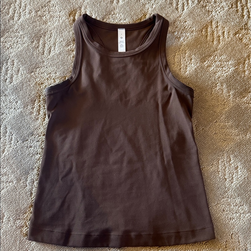 Brown Lululemon tank
Size 2
Great condition 
No built in bra